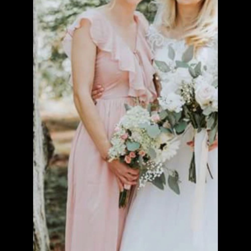 Floor length. Blush pink backless dress.